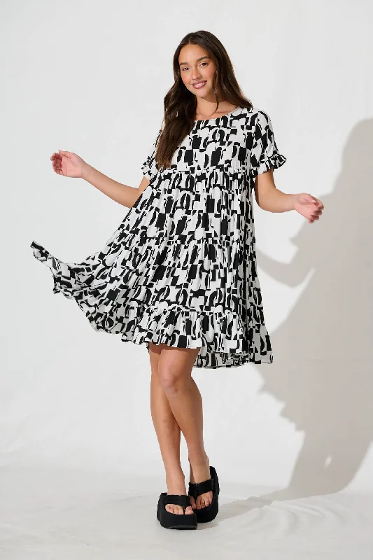 Jacklyn Smock Dress in Black and White Graphic Print Best floral dresses for elegant looks